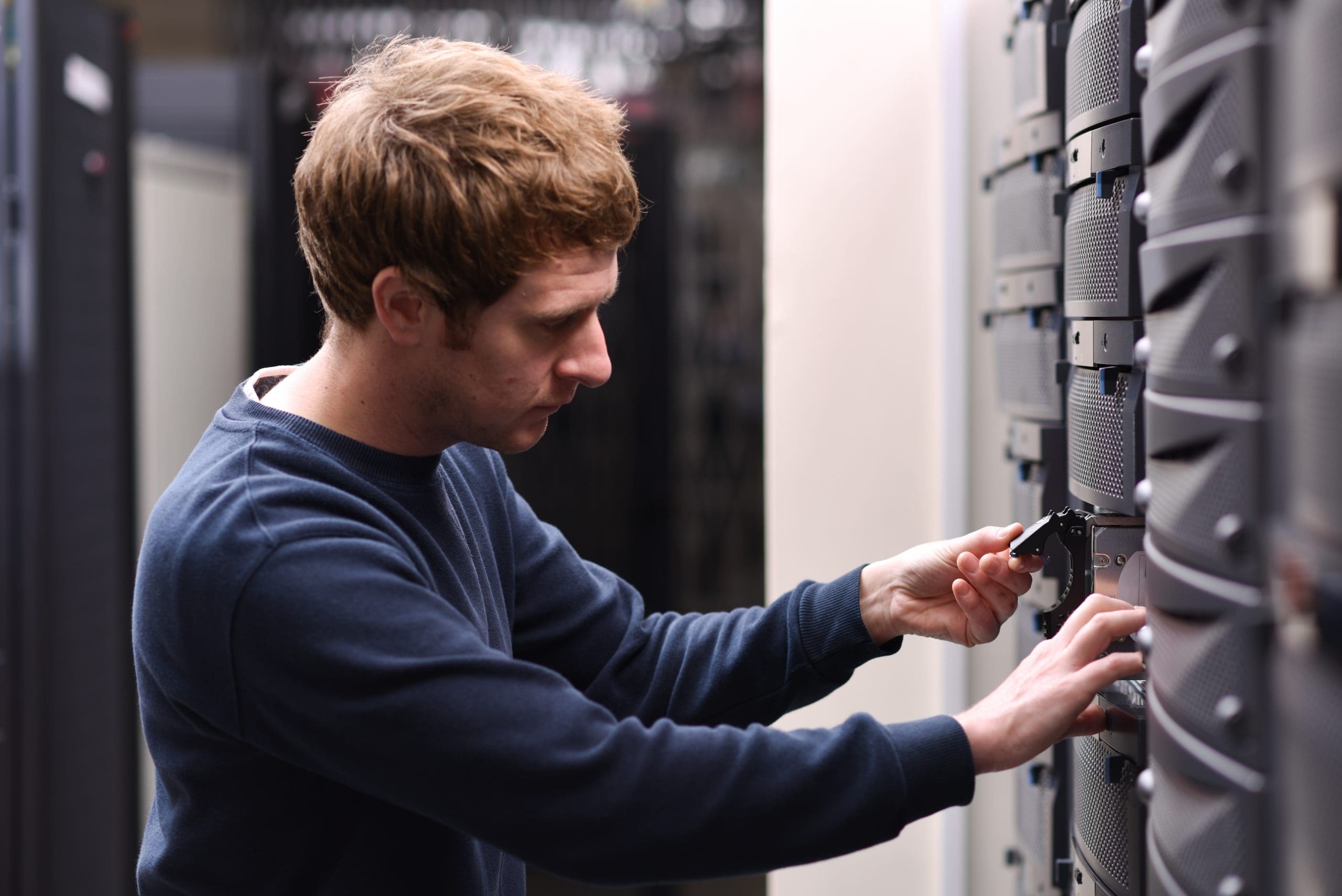 Cantium employee removing storage from a server in the cloud data centre