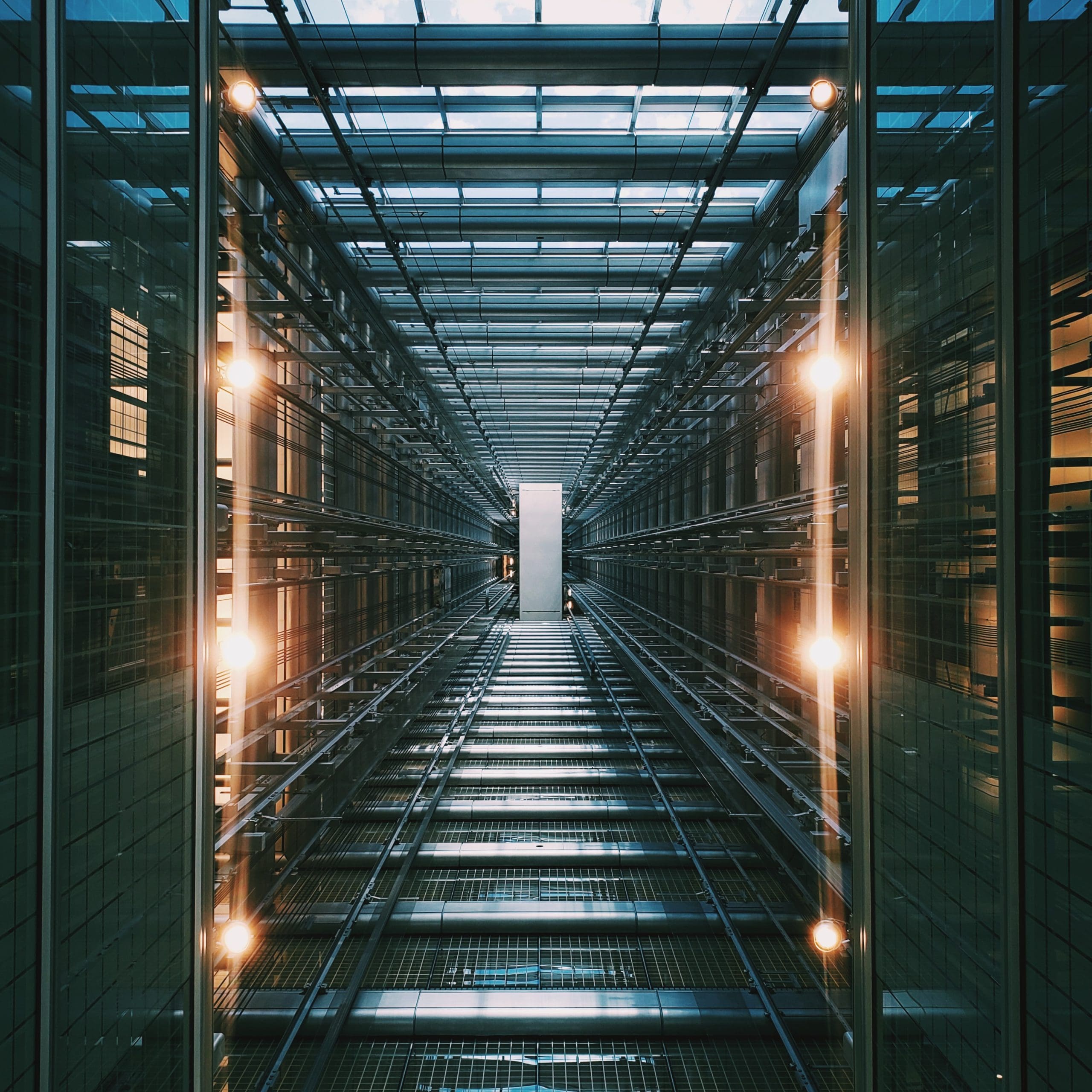 Stock photograph of a long hall way within a data centre