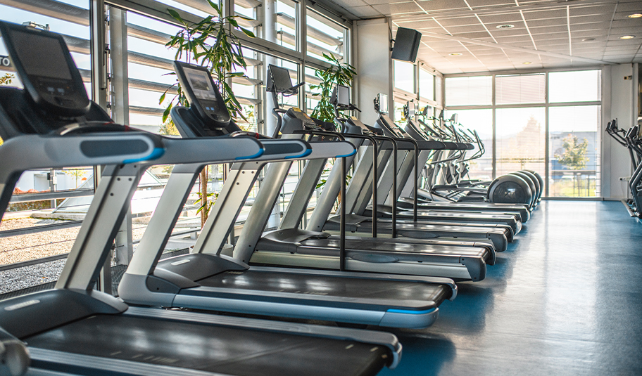 Photographs of treadmills in a gym